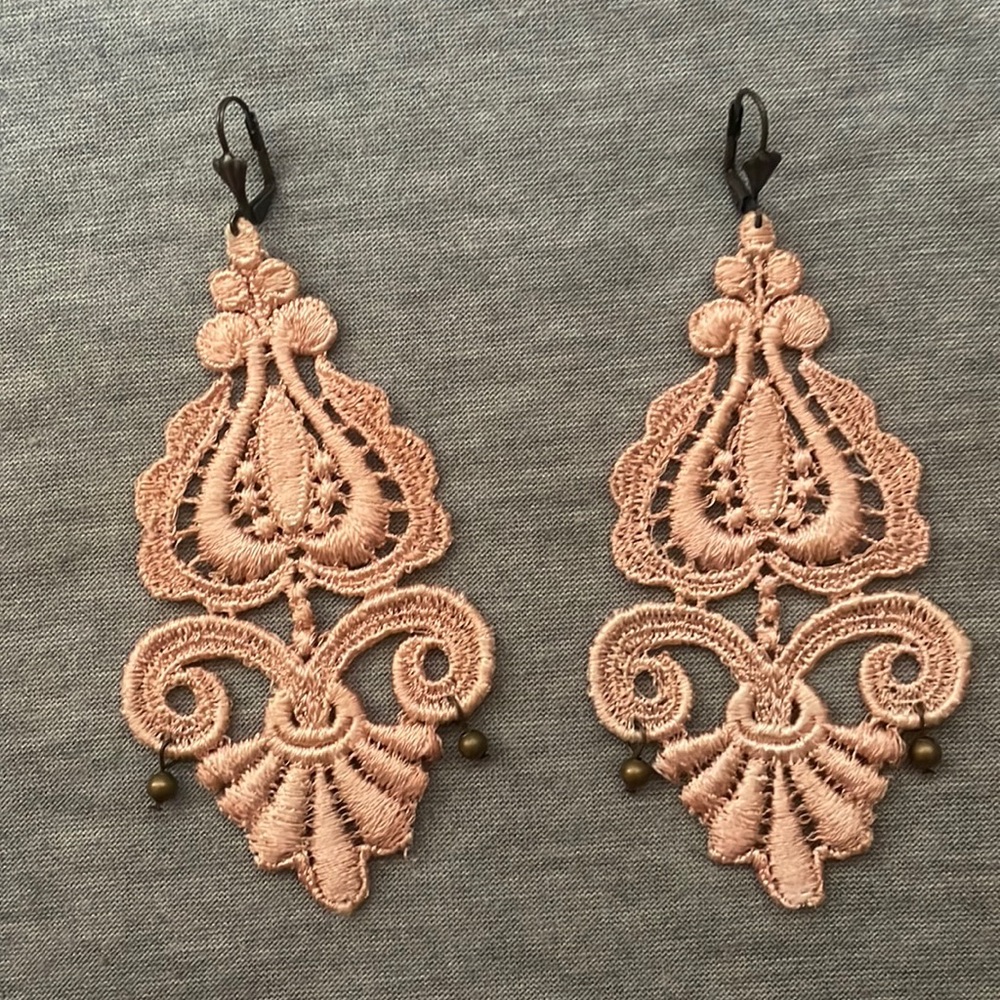 Never worn, detailed knit work earrings, beautiful soft pink and lightweight.